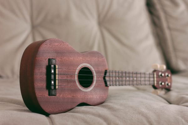 picture of Ukulele on its side.